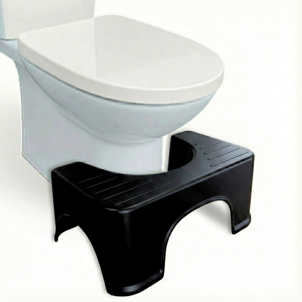Zwart toiletkrukje van 19 cm hoog onder een wit toilet, schuin van voren.