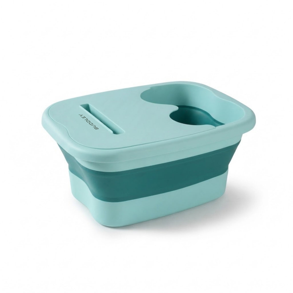 Compact groen inklapbaar voetenbad met een handige deksel en een hoogte van 6 cm wanneer ingeklapt.